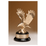 Gold Metal Eagle on a Black Piano Finish Base